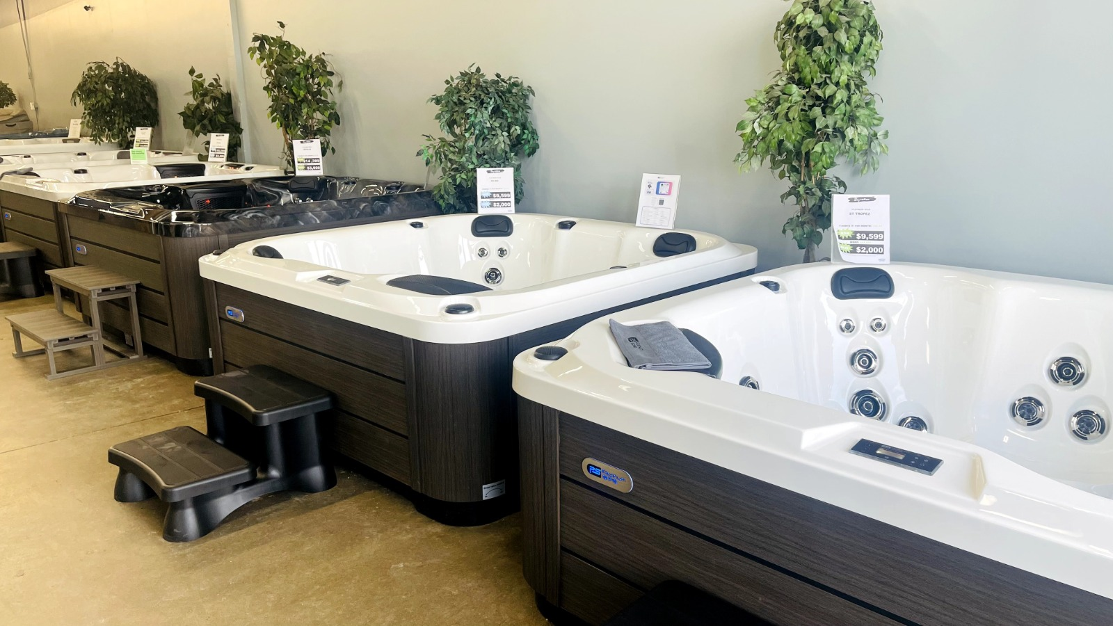 Hot tub displays inside The Hot Tub Specialists Edmonton showroom